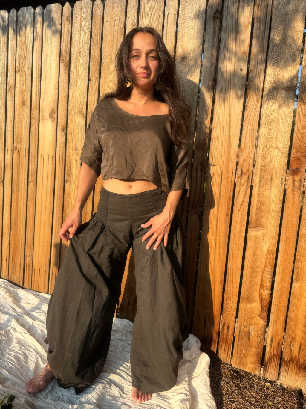 Woman wearing the Italian Pants with The Ease Tee 100% silk crop top.