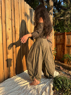 The Italian Pants in Olive styled with The Ease Tee in soft evening light.