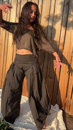 Woman wearing The Ease Tee silk crop top with The Italian Pants.